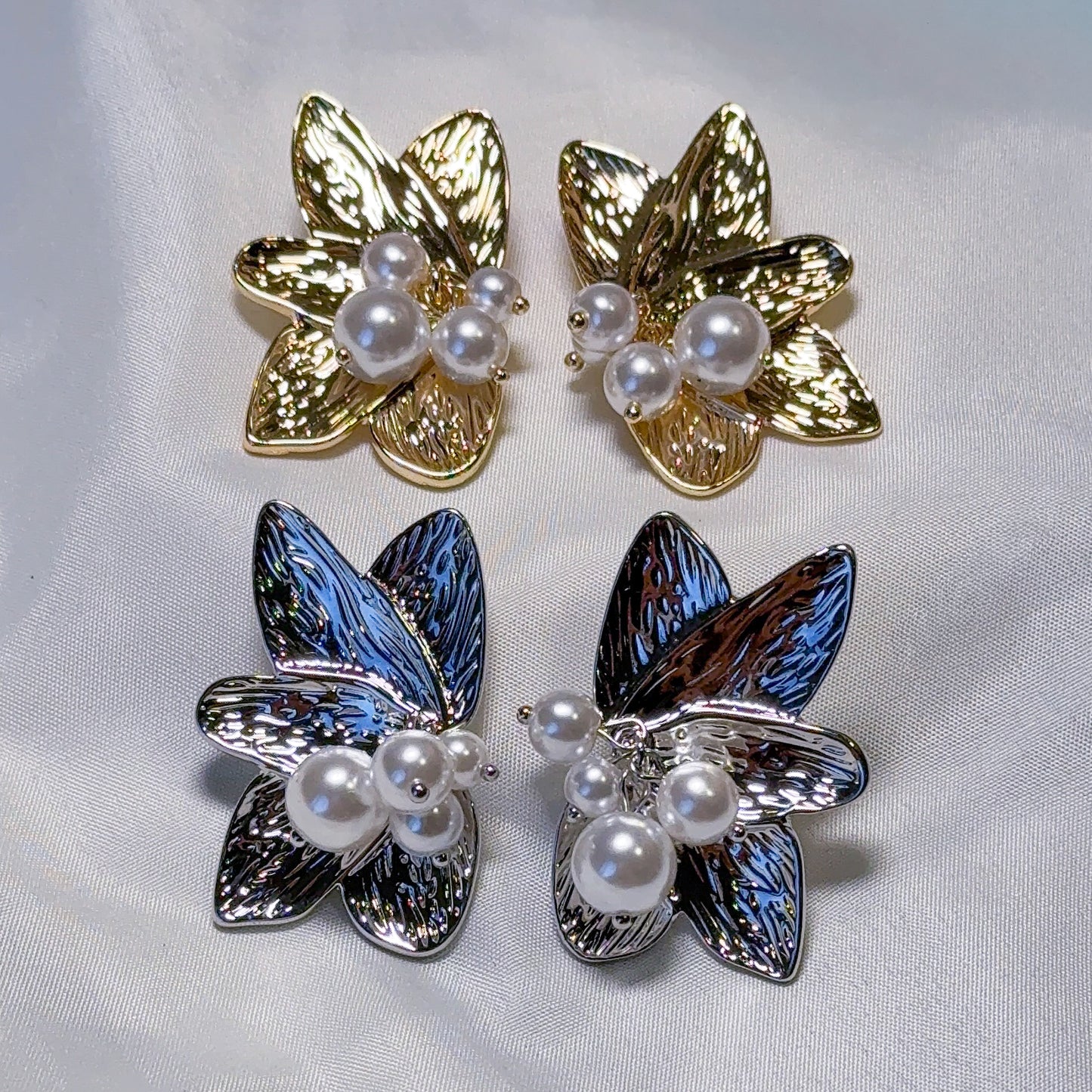 Arete flor partido perlas