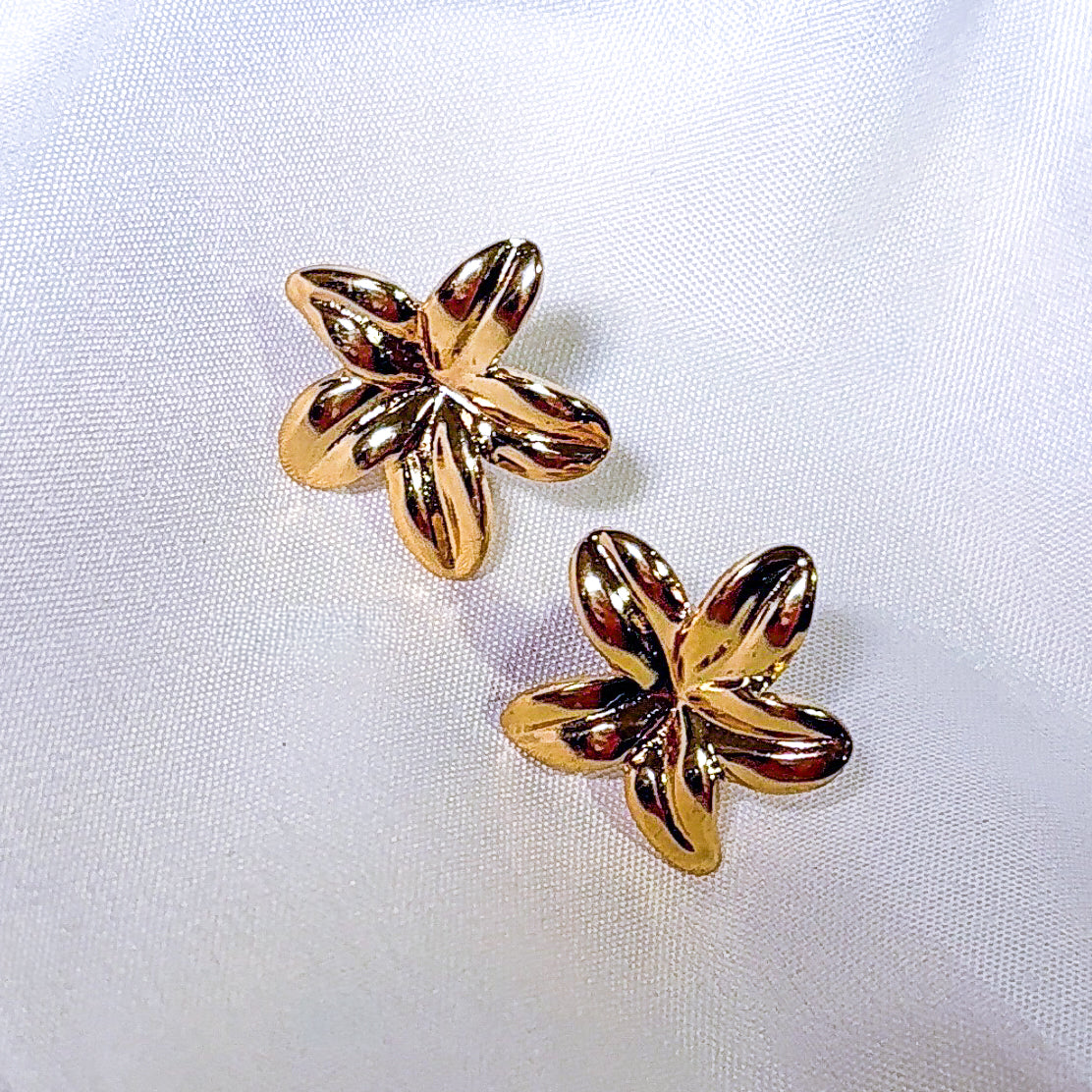 Arete flor palmito XS